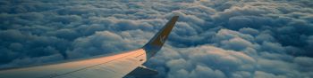 Ramadan, airplane wing, above the clouds Wallpaper 1590x400