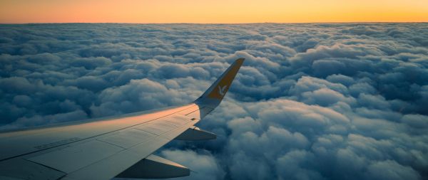 Ramadan, airplane wing, above the clouds Wallpaper 2560x1080