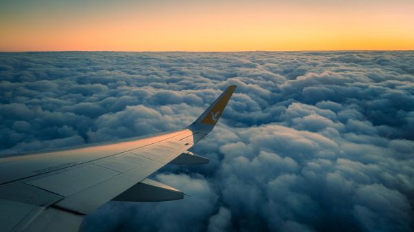 Ramadan, airplane wing, above the clouds Wallpaper 1366x768