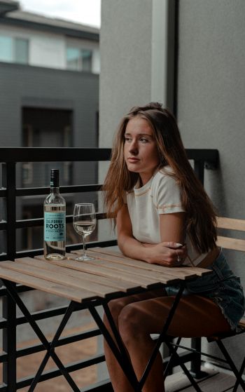 girl, balcony, bottle of wine Wallpaper 1752x2800
