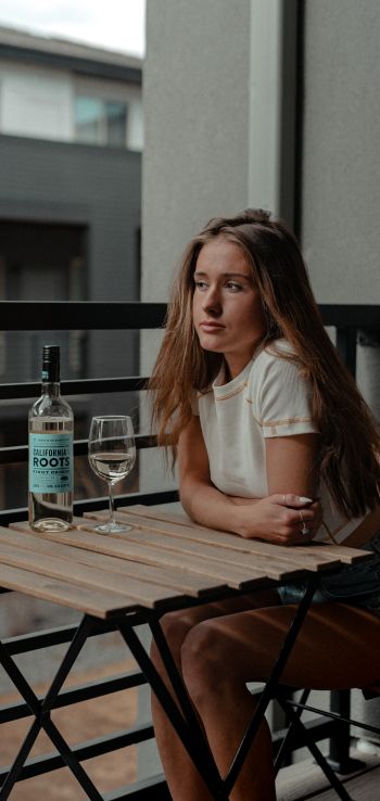 girl, balcony, bottle of wine Wallpaper 720x1520