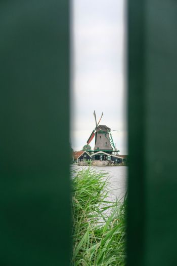 Zaanse Shans, Zandam, The Netherlands, windmill in the distance Wallpaper 640x960