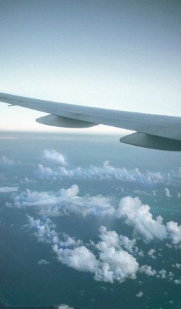 airplane wing, clouds Wallpaper 600x1024