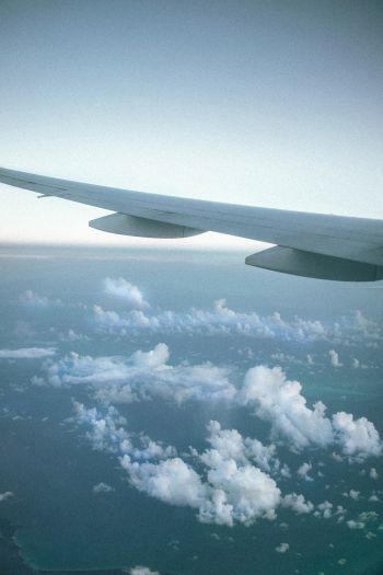 airplane wing, clouds Wallpaper 640x960