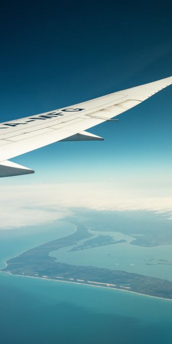 airplane wing, above ground Wallpaper 720x1440