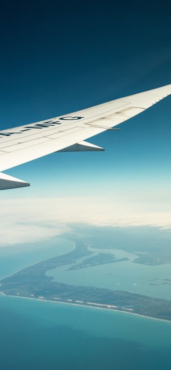airplane wing, above ground Wallpaper 1170x2532