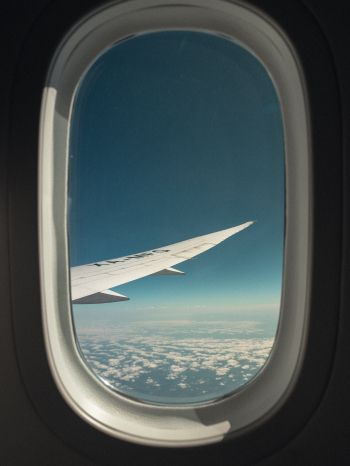 airplane wing, window view Wallpaper 1620x2160
