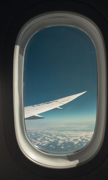 airplane wing, window view Wallpaper 1200x2000