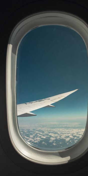 airplane wing, window view Wallpaper 720x1440