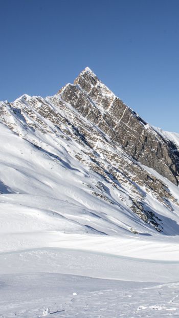Обои 640x1136 зимние горы, горные хребты