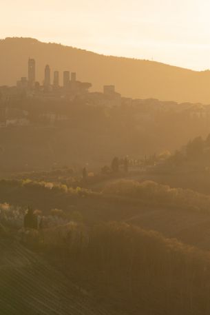 province of Siena, Italy, over the city Wallpaper 640x960