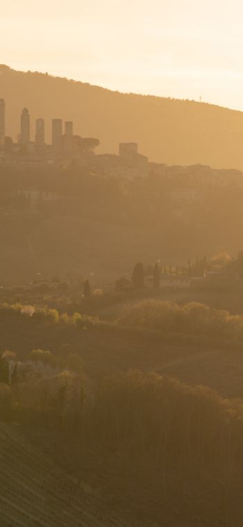 province of Siena, Italy, over the city Wallpaper 1242x2688