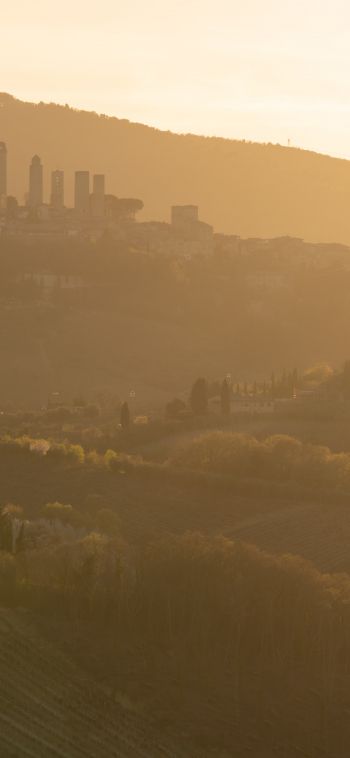 province of Siena, Italy, over the city Wallpaper 1080x2340