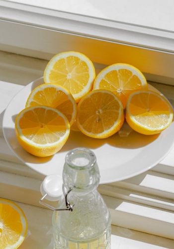 bottle, lemons Wallpaper 1668x2388