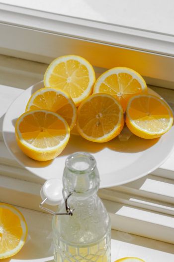 bottle, lemons Wallpaper 640x960