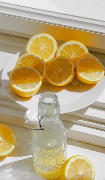 bottle, lemons Wallpaper 600x1024