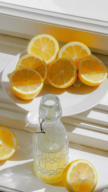 bottle, lemons Wallpaper 640x1136