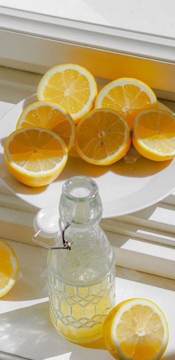 bottle, lemons Wallpaper 1080x2220