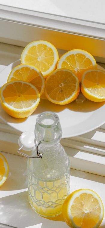 bottle, lemons Wallpaper 1080x2340