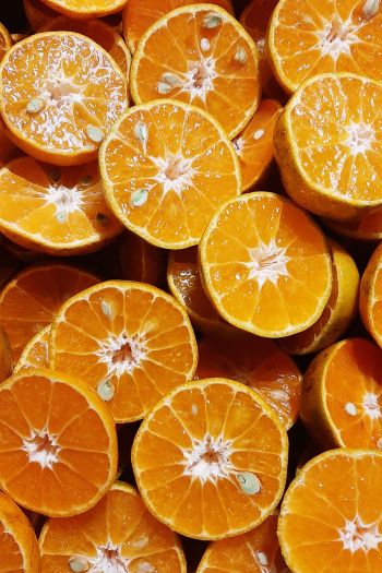 Обои 640x960 дольки апельсина, апельсины