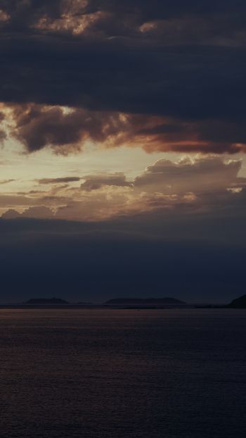 evening sea, rocks Wallpaper 1080x1920