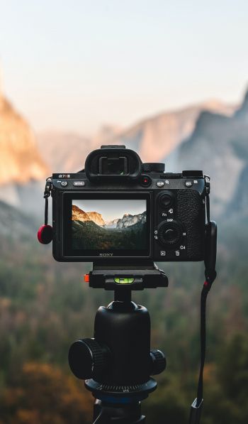 camera, shooting outdoors Wallpaper 600x1024