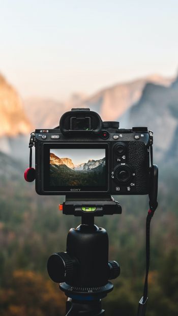 camera, shooting outdoors Wallpaper 640x1136