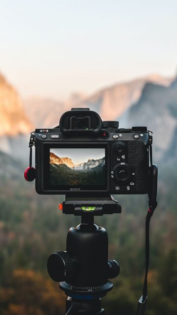 camera, shooting outdoors Wallpaper 720x1280