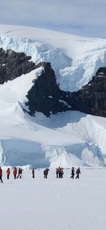 Antarctica, snowy mountains Wallpaper 1125x2436