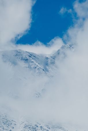 Обои 3483x5224 горы, снег, облака