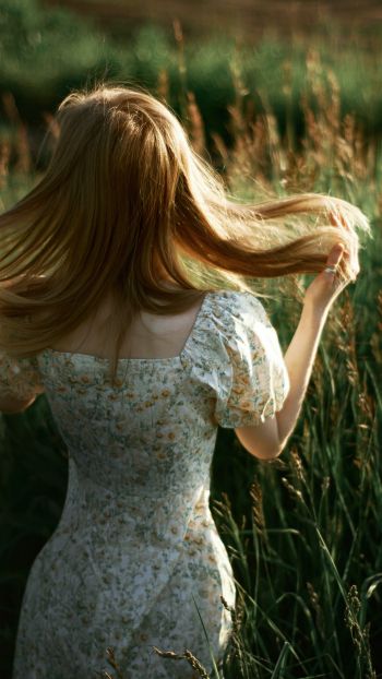 girl with loose hair Wallpaper 750x1334