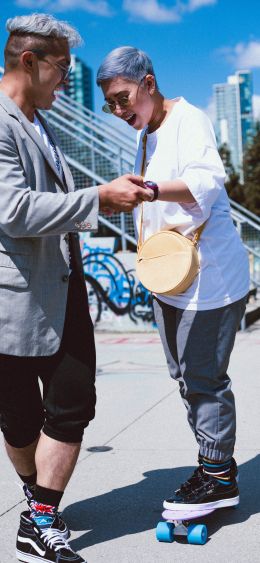 boy with girl, skateboard Wallpaper 1080x2340