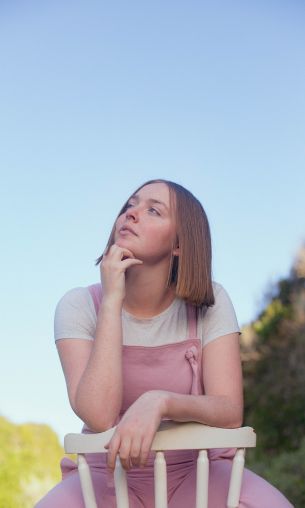 girl on chair Wallpaper 1200x2000