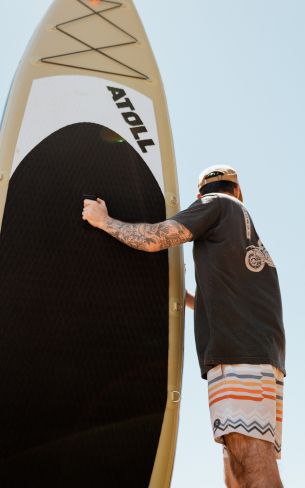 guy and surfer board Wallpaper 800x1280