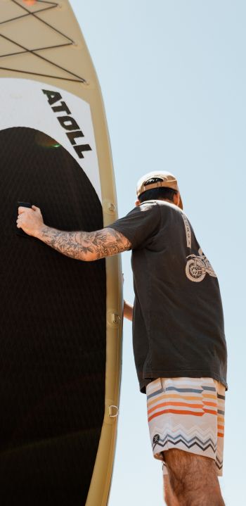 guy and surfer board Wallpaper 1080x2220