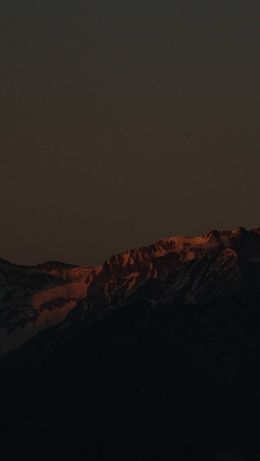 Обои 640x1136 горы в момент заката