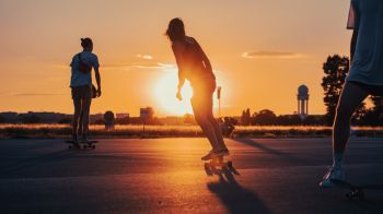 skateboarders, sunset Wallpaper 2048x1152