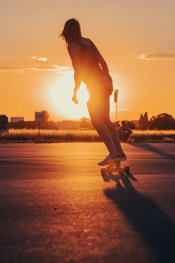 skateboarders, sunset Wallpaper 640x960