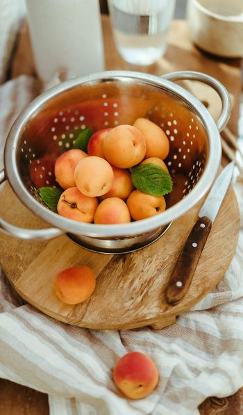 cup with peaches Wallpaper 600x1024