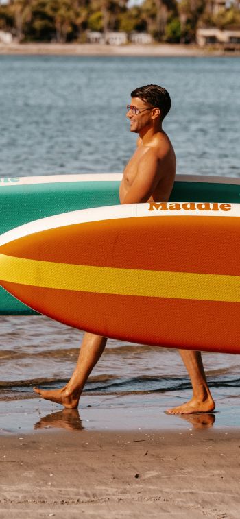 surfers, beach Wallpaper 828x1792