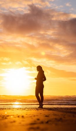 girl on sunset background Wallpaper 600x1024