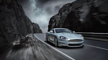 Обои 1600x900 Aston Martin, высокая скорость