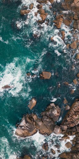 over rocks, sea, stones Wallpaper 720x1440