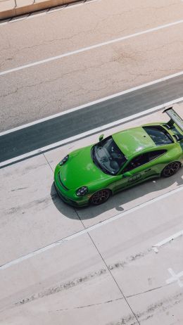 Обои 1440x2560 зеленый автомобиль