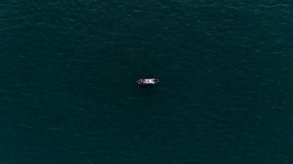 over the sea, boat Wallpaper 2048x1152