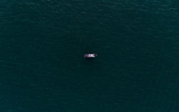 over the sea, boat Wallpaper 2560x1600