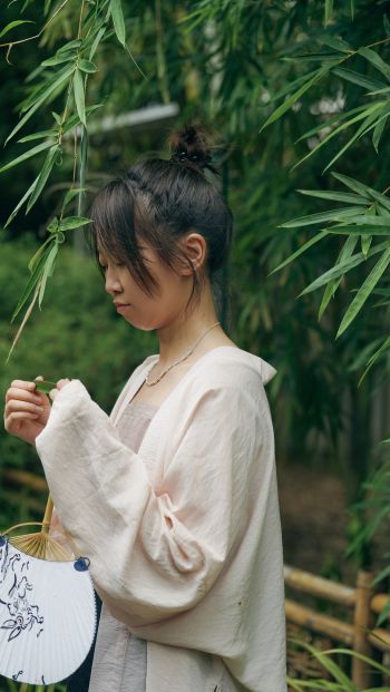 Oriental girl in the forest Wallpaper 640x1136