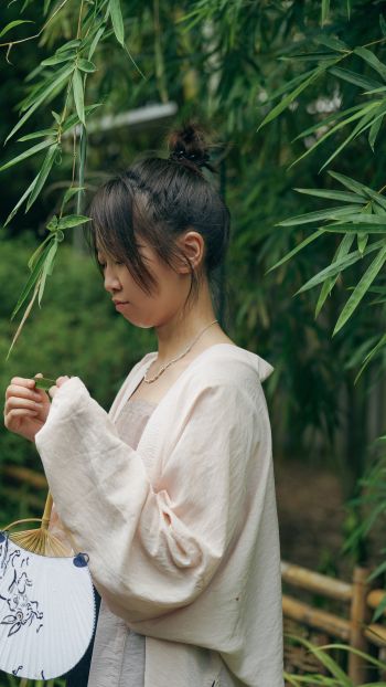 Oriental girl in the forest Wallpaper 750x1334