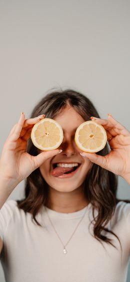 girl with oranges Wallpaper 1170x2532