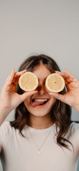 girl with oranges Wallpaper 1080x2340